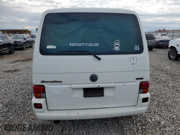 2000 Volkswagen EuroVan с VIN WV2MH4701YH035166, выставлен на аукционе Copart как лот 55680175 с пробегом 220 080 миль миль и Чистый • Clean title. История ставок и продаж доступна на DreamBid. Изображение 6.