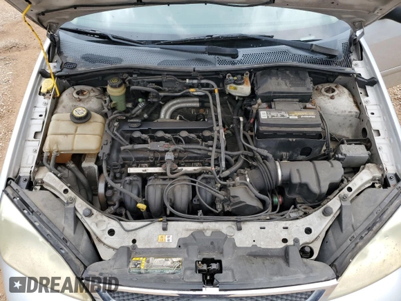 2006 Ford Focus S с VIN 1FAFP34N76W122783, выставлен на аукционе Copart как лот 60406325 с пробегом 290 434 миль миль и Списание • Salvage title. История ставок и продаж доступна на DreamBid. Изображение 11.
