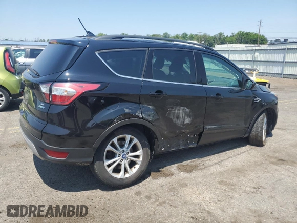 2018 Ford Escape SE z VIN 1FMCU9GD3JUA78244, wystawiony jako Copart lot #59508955 z przebiegiem 108 273 mil mil oraz Szkoda całkowita • Salvage title. Historia ofert i sprzedaży dostępna na DreamBid. Obrazek 3.