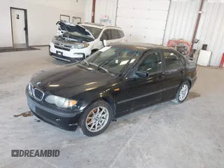 2004 BMW 3 Series 325i with VIN WBAEV334X4KL63050, listed as a IAAI auction lot 42117698 with 173,687 mi miles. Bid and sale history available at carsss.com. Image 2.