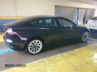 2023 Tesla Model 3 z VIN 5YJ3E1EAXPF433682, wystawiony jako Copart lot #59864445 z przebiegiem 85 738 mil mil oraz Czysty tytuł • Clean title. Historia ofert i sprzedaży dostępna na DreamBid. Obrazek 3.