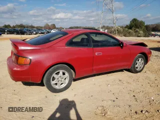 1994 Toyota Celica ST with VIN JT2AT00N6R0028351, listed as a Copart auction lot 80139234 with 219,786 mi miles and Salvage Title. Bid and sale history available at carsss.com. Image 3.