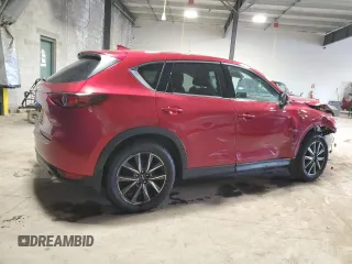 2018 Mazda CX-5 Grand Touring z VIN JM3KFBDMXJ0432197, wystawiony jako Copart lot #50383035 z przebiegiem Nie podano mil oraz Szkoda całkowita • Salvage title. Historia ofert i sprzedaży dostępna na DreamBid. Obrazek 3.