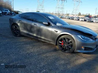 2018 Tesla Model S 75D with VIN 5YJSA1E4XJF291438, listed as a IAAI auction lot 41311045 with Not Provided miles and . Bid and sale history available at DreamBid. Image 1.