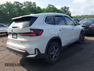 2023 BMW X1 xDrive28i with VIN WBX73EF03P5X21780, listed as a IAAI auction lot 42366909 with 14,673 mi miles and . Bid and sale history available at DreamBid. Image 4.