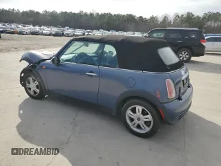 2005 MINI Convertible with VIN WMWRF33555TF62593, listed as a Copart auction lot 48305985 with 172,839 mi miles and Salvage title. Bid and sale history available at DreamBid. Image 2.