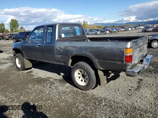 1989 Toyota Pickup DLX z VIN JT4VN13D0K0001910, wystawiony jako Copart lot #77413274 z przebiegiem 311 223 mil mil oraz Szkoda całkowita • Salvage title. Historia ofert i sprzedaży dostępna na DreamBid. Obrazek 2.