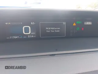 2020 Toyota Prius L Eco z VIN JTDKARFU1L3111938, wystawiony jako IAAI lot #41578853 z przebiegiem 117 641 mil mil oraz . Historia ofert i sprzedaży dostępna na DreamBid. Obrazek 7.