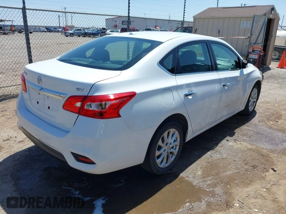 2019 Nissan Sentra S z VIN 3N1AB7AP5KY285776, wystawiony jako IAAI lot #41969976 z przebiegiem 87 187 mil mil oraz . Historia ofert i sprzedaży dostępna na DreamBid. Obrazek 4.