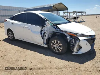 2022 Toyota Prius LE z VIN JTDKAMFP8N3197278, wystawiony jako Copart lot #55828765 z przebiegiem 122 709 mil mil oraz Szkoda całkowita • Salvage title. Historia ofert i sprzedaży dostępna na DreamBid. Obrazek 4.