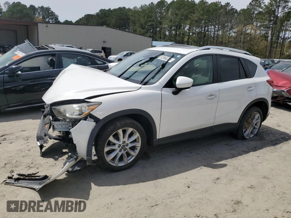 2015 Mazda CX-5 Grand Touring with VIN JM3KE4DY0F0458719, listed as a Copart auction lot 52960365 with 128,372 mi miles and Salvage Title. Bid and sale history available at DreamBid. Image 1.