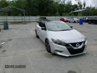 2017 Nissan Maxima Platinum with VIN 1N4AA6AP9HC387387, listed as a Copart auction lot 58727605 with 335,186 mi miles and Salvage title. Bid and sale history available at DreamBid. Image 14.