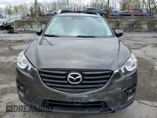 2016 Mazda CX-5 Grand Touring with VIN JM3KE4DY5G0848717, listed as a Copart auction lot 53249895 with 86,746 mi miles and Salvage Title. Bid and sale history available at carsss.com. Image 5.