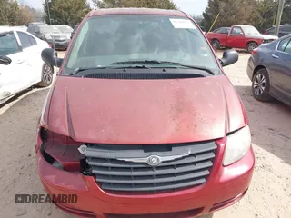 2007 Chrysler Town & Country SWB with VIN 1A4GJ45R57B120394, listed as a IAAI auction lot 41684731 with 219,802 mi miles. Bid and sale history available at carsss.com. Image 12.