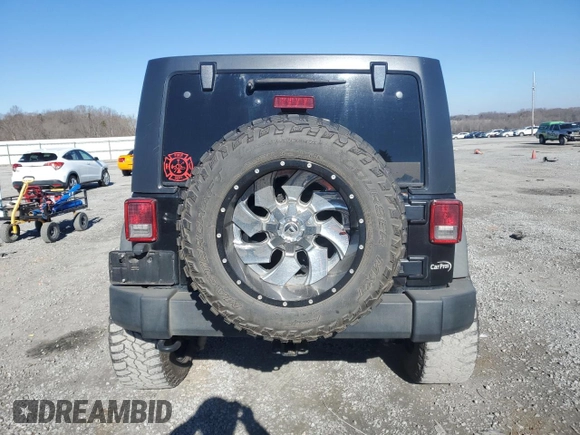 2014 Jeep Wrangler Unlimited Sport with VIN 1C4BJWDG8EL261074, listed as a Copart auction lot 87631195 with 163,225 mi miles and Salvage Title. Bid and sale history available at carsss.com. Image 6.
