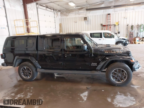 2020 Jeep Gladiator Overland with VIN 1C6HJTFG5LL140142, listed as a IAAI auction lot 42452310 with 111,884 mi miles and . Bid and sale history available at DreamBid. Image 13.