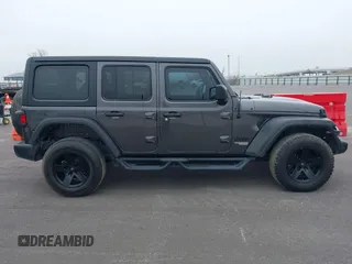 2021 Jeep Wrangler Unlimited Willys with VIN 1C4HJXDM4MW825094, listed as a IAAI auction lot 41515794 with 41,653 mi miles and . Bid and sale history available at DreamBid. Image 13.