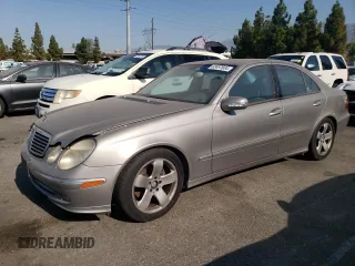 2005 Mercedes-Benz E 5.0L with VIN WDBUF70J75A693702, listed as a Copart auction lot 63497604 with 122,410 mi miles and Clean Title. Bid and sale history available at carsss.com. Image 1.