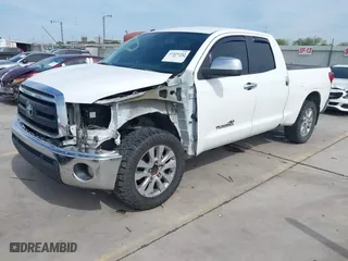 2012 Toyota Tundra 2WD Truck with VIN 5TFRM5F1XCX040123, listed as a IAAI auction lot 41848353 with 241,428 mi miles. Bid and sale history available at carsss.com. Image 20.