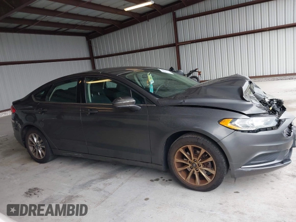 2017 Ford Fusion SE z VIN 3FA6P0HD2HR270782, wystawiony jako IAAI lot #42310190 z przebiegiem 107 133 mil mil oraz . Historia ofert i sprzedaży dostępna na DreamBid. Obrazek 13.