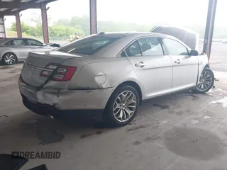 2014 Ford Taurus Limited с VIN 1FAHP2F89EG186147, выставлен на аукционе IAAI как лот 42228000 с пробегом 179 863 миль миль и . История ставок и продаж доступна на DreamBid. Изображение 4.