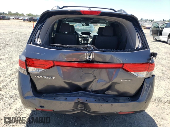 2014 Honda Odyssey Touring с VIN 5FNRL5H92EB116923, выставлен на аукционе Copart как лот 58060645 с пробегом 106 285 миль миль и Списание • Salvage title. История ставок и продаж доступна на DreamBid. Изображение 6.