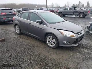 2012 Ford Focus SEL with VIN 1FAHP3H26CL239437, listed as a IAAI auction lot 41164604 with 169,946 mi miles. Bid and sale history available at carsss.com. Image 1.