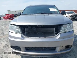 2015 Dodge Journey SE z VIN 3C4PDCAB0FT698674, wystawiony jako IAAI lot #42308994 z przebiegiem 97 640 mil mil oraz . Historia ofert i sprzedaży dostępna na DreamBid. Obrazek 6.
