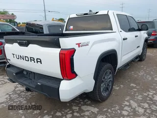 2023 Toyota Tundra SR5 with VIN 5TFLA5DB0PX077679, listed as a IAAI auction lot 42354545 with 31,838 mi miles and . Bid and sale history available at DreamBid. Image 4.