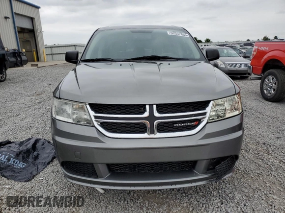 2013 Dodge Journey American Value with VIN 3C4PDCAB7DT500878, listed as a Copart auction lot 58397655 with 183,755 mi miles and Salvage title. Bid and sale history available at DreamBid. Image 5.