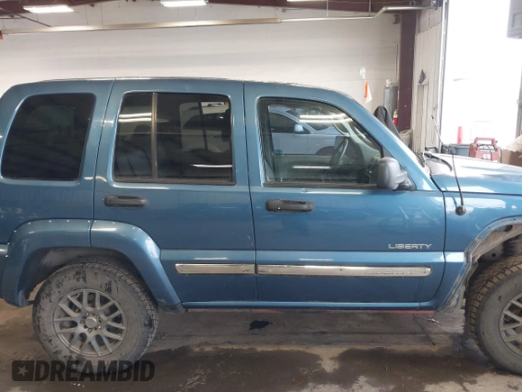 2004 Jeep Liberty Limited with VIN 1J4GK58K84W226666, listed as a IAAI auction lot 41764238 with 148,664 mi miles. Bid and sale history available at carsss.com. Image 13.