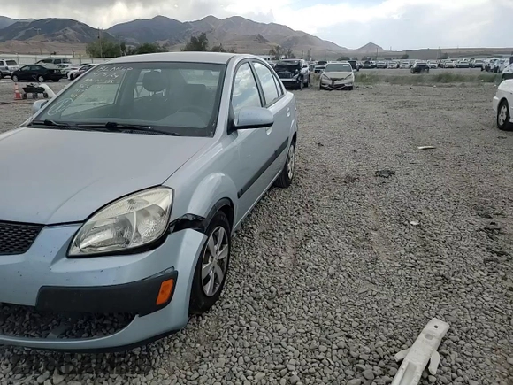 2009 Kia Rio LX with VIN KNADE223496469797, listed as a Copart auction lot 71005774 with 130,675 mi miles and Salvage Title. Bid and sale history available at DreamBid. Image 11.