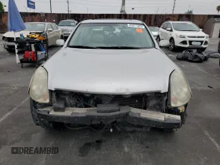 2003 Infiniti G35 w/Leather with VIN JNKCV51E73M016617, listed as a Copart auction lot 60571025 with 244,954 mi miles and Salvage title. Bid and sale history available at DreamBid. Image 5.