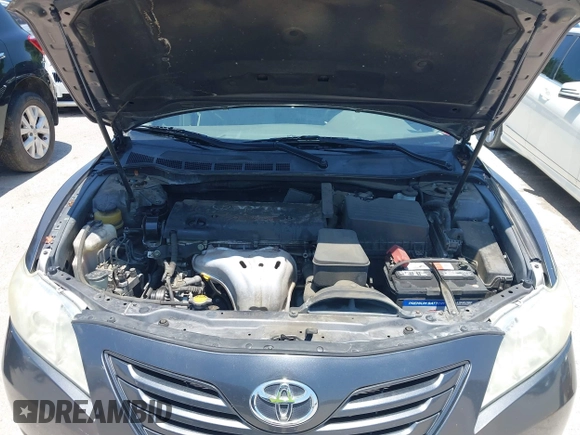 2009 Toyota Camry z VIN 4T1BE46K09U873808, wystawiony jako IAAI lot #42515981 z przebiegiem 115 188 mil mil oraz . Historia ofert i sprzedaży dostępna na DreamBid. Obrazek 10.