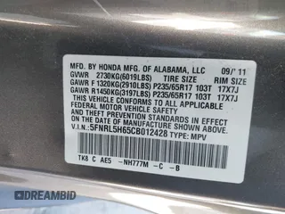 2012 Honda Odyssey EX-L with VIN 5FNRL5H65CB012428, listed as a IAAI auction lot 42164272 with 256,253 mi miles and . Bid and sale history available at carsss.com. Image 9.