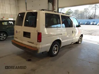 2002 Chevrolet Astro with VIN 1GNDM19X32B146063, listed as a IAAI auction lot 41595819 with 77,364 mi miles. Bid and sale history available at carsss.com. Image 4.