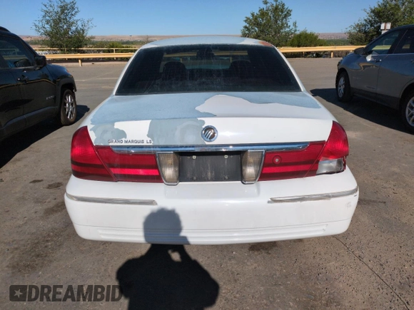 2003 Mercury Grand Marquis LS Premium с VIN 2MEFM75W93X701046, выставлен на аукционе Copart как лот 57321095 с пробегом 89 932 миль миль и Списание • Salvage title. История ставок и продаж доступна на DreamBid. Изображение 6.