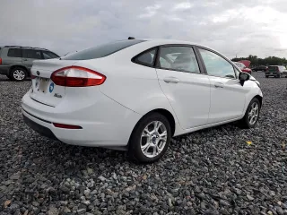 2015 Ford Fiesta SE with VIN 3FADP4BJ2FM219659, listed as a Copart auction lot 52304875 with 67,460 mi miles and Salvage Title. Bid and sale history available at carsss.com. Image 3.