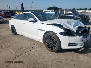 2014 Jaguar XJ Supercharged z VIN SAJWA1GT4EMV60053, wystawiony jako Copart lot #57643005 z przebiegiem 48 139 mil mil oraz Szkoda całkowita • Salvage title. Historia ofert i sprzedaży dostępna na DreamBid. Obrazek 4.
