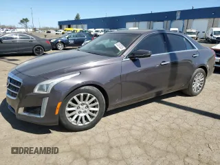 2014 Cadillac CTS Luxury AWD with VIN 1G6AX5S3XE0167903, listed as a Copart auction lot 53507035 with 119,179 mi miles and Clean Title. Bid and sale history available at DreamBid. Image 1.