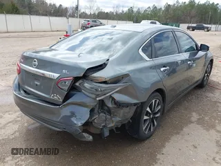 2018 Nissan Altima S with VIN 1N4AL3APXJC122072, listed as a IAAI auction lot 41749875 with 184,127 mi miles and . Bid and sale history available at DreamBid. Image 6.