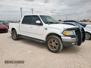 2001 Ford F-150 XLT z VIN 1FTRW08L31KF27329, wystawiony jako Copart lot #61018835 z przebiegiem Nie podano mil oraz Czysty tytuł • Clean title. Historia ofert i sprzedaży dostępna na DreamBid. Obrazek 4.