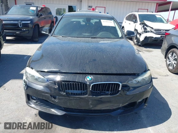 2014 BMW 3 Series 320i with VIN WBA3B1G5XENS80130, listed as a IAAI auction lot 42304306 with 125,743 mi miles and . Bid and sale history available at DreamBid. Image 11.