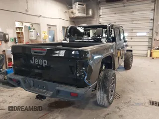 2021 Jeep Gladiator Willys with VIN 1C6HJTAGXML514043, listed as a IAAI auction lot 41869052 with 37,783 mi miles. Bid and sale history available at carsss.com. Image 4.