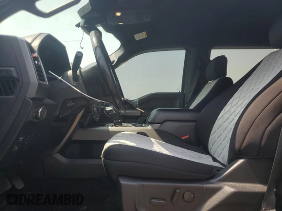 2019 Ford F-150 XL with VIN 1FTEW1EP2KFB27283, listed as a Copart auction lot 64563225 with 213,499 mi miles and Clean title. Bid and sale history available at DreamBid. Image 7.