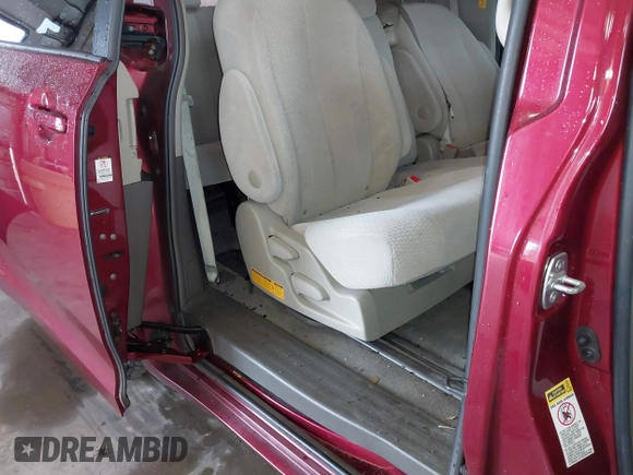 2012 Toyota Sienna LE AAS with VIN 5TDKK3DC5CS277303, listed as a IAAI auction lot 42162586 with 128,656 mi miles and . Bid and sale history available at DreamBid. Image 8.