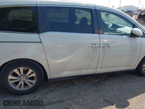 2014 Honda Odyssey EX-L with VIN 5FNRL5H63EB131596, listed as a IAAI auction lot 42402427 with 106,156 mi miles and . Bid and sale history available at DreamBid. Image 13.