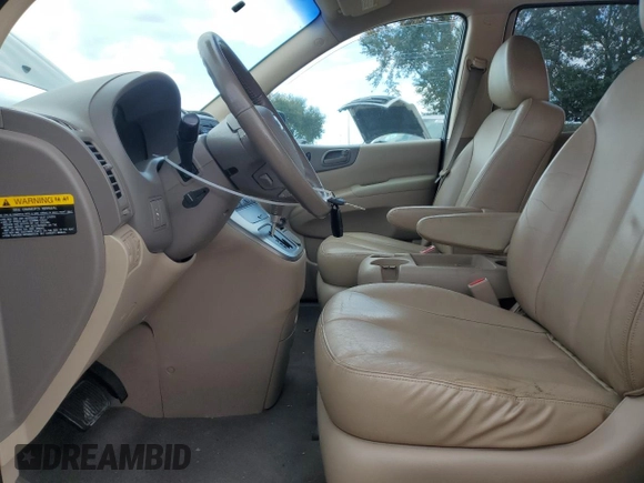 2009 Kia Sedona EX with VIN KNDMB233396299667, listed as a Copart auction lot 80186774 with 197,328 mi miles and Salvage Title. Bid and sale history available at carsss.com. Image 7.