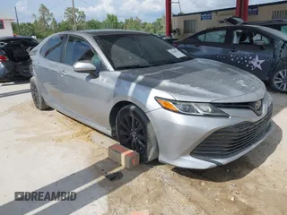 2019 Toyota Camry LE z VIN 4T1B11HK8KU228482, wystawiony jako IAAI lot #42200127 z przebiegiem 125 855 mil mil oraz . Historia ofert i sprzedaży dostępna na DreamBid. Obrazek 1.