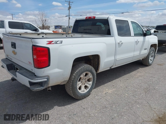 2018 Chevrolet Silverado 1500 LT with VIN 1GCUKREC5JF133998, listed as a IAAI auction lot 41880805 with 166,258 mi miles and . Bid and sale history available at DreamBid. Image 4.